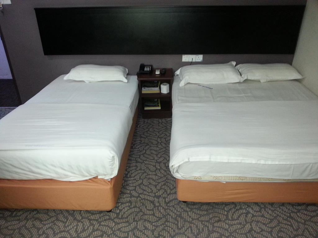 Oriental Inn Кучинг Стая снимка