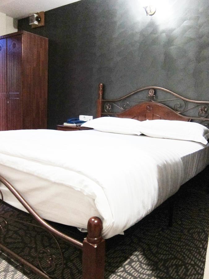 Oriental Inn Кучинг Екстериор снимка