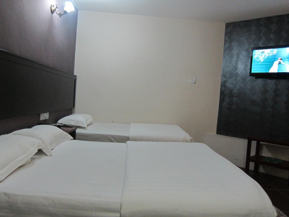 Oriental Inn Кучинг Екстериор снимка