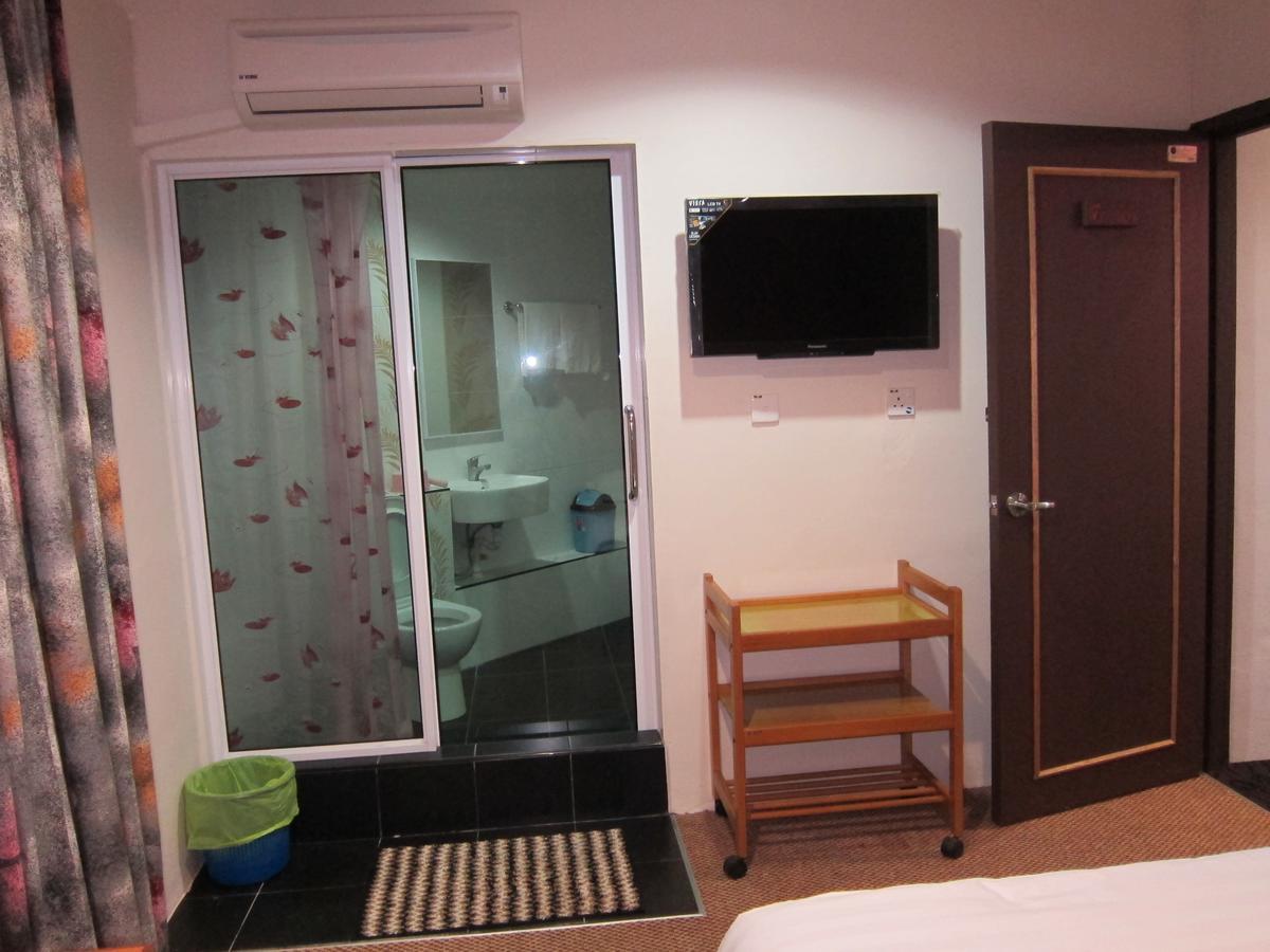 Oriental Inn Кучинг Екстериор снимка